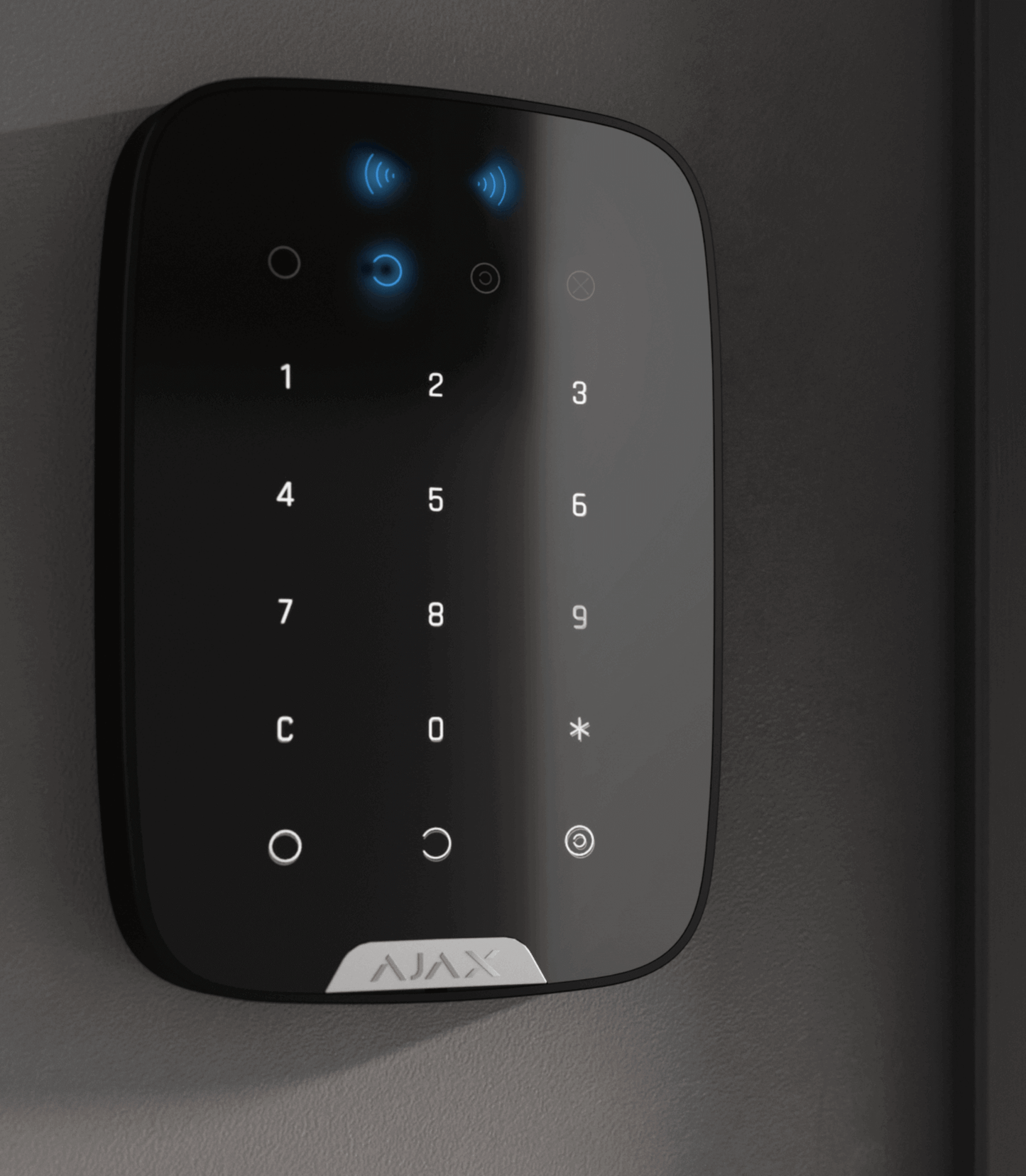 Black Ajax KeyPad Plus a wireless touch keypad mounted on a wall for home security, 165 × 113 × 20 mm in size, 267 grams in weight. used for the the Ajax security system, front view of device